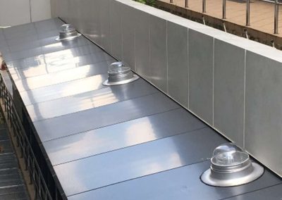 Captor Domes on Metal Panel Roof Round Capping