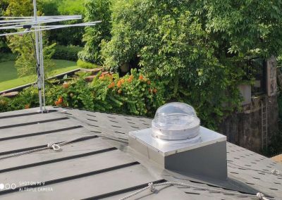 Captor Dome on Corrugated Metal Roof Square Seamless Capping Steel kerb and flashing done by roofers